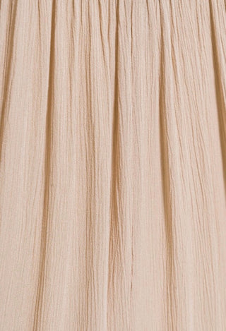 beige skirt fabric up close