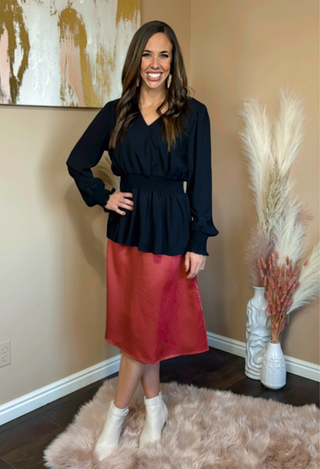 Red elastic waist skirt with black top