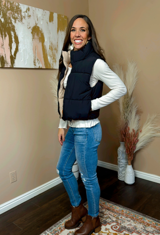 black puffer vest reverses to cream