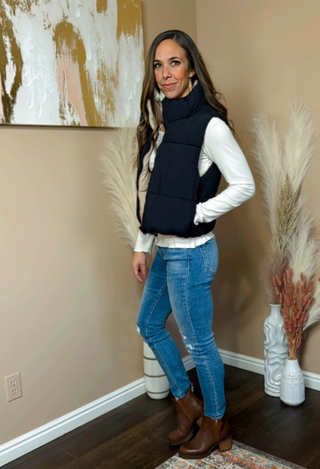 Women's black puffer vest