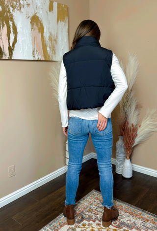 black cropped puffer vest back view