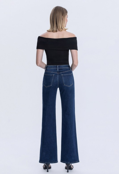 Vervet High Rise Vintage Flare Jeans back view with black top
