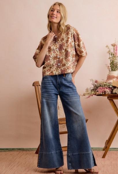 Brown floral sweater with wide leg jeans