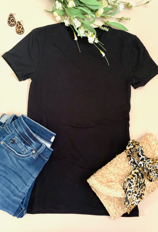 black tee flat lay