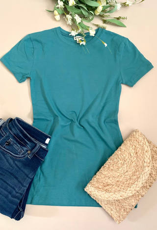 Dark teal tee flatlay