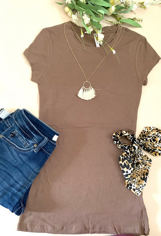 mocha tee flatlay with jeans and leopard hair tie