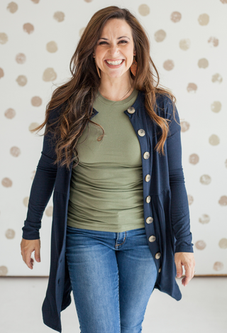 Alexia Buttoned Cardigan in Navy with green top and jeans