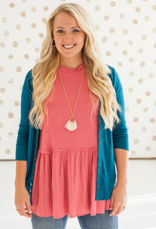 Kacie Ruffle Bottom Top in rose with teal sweater