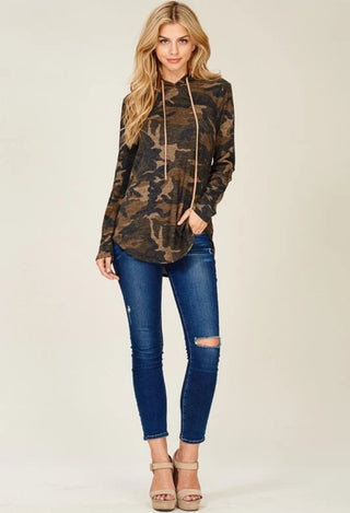 camo hoodie with jeans and heels