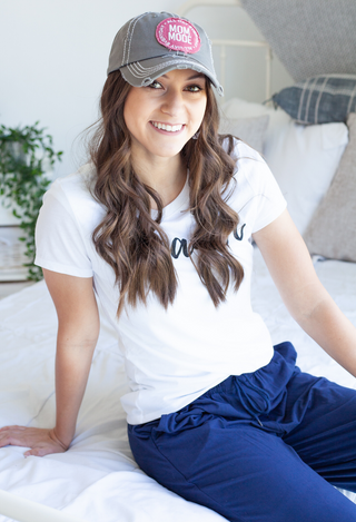 navy Joggers with hat and white tee