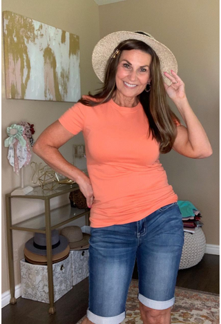 Essential Tee in coral with shorts