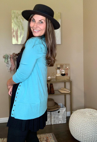 perfect sweater mint with black pants and hat