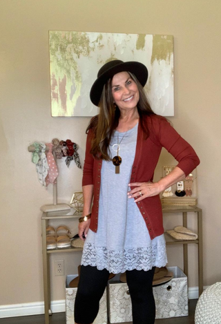 grey lace tank with burgundysweater and black pants