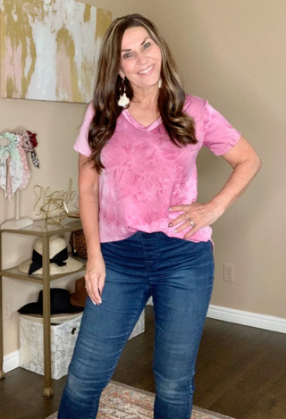 Mauvelous pink top with dark jeans