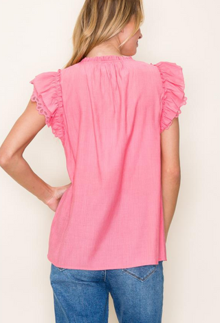 Pretty girl blouse back view coral