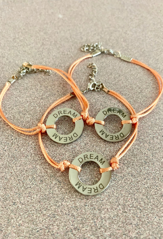 Dream bracelet with peach cord