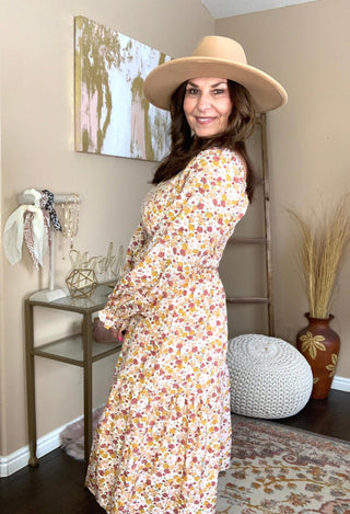 floral dress with tan hat