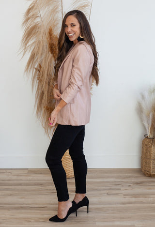 black jeans wiith pink blazer