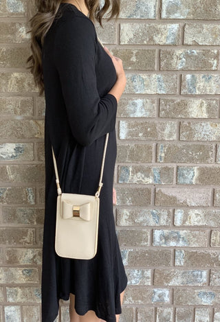 small cream bag with bow