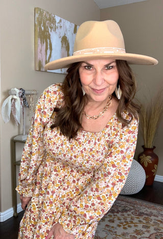 Pink yellow floral dress with tan hat