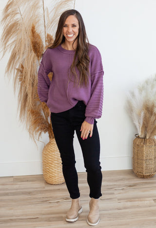 purple sweater