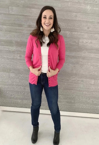 hot pink sweater cardigan and jeans
