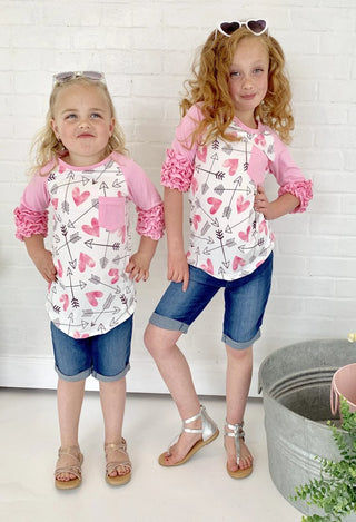 Girls hearts and arrows pink tops and shorts